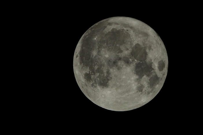 The full harvest moon is seen Friday, Sept. 13, 2019, in the skies above Overland Park, Kan. 