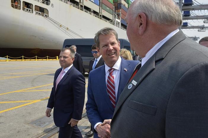 Gov. Brian Kemp, center, greets Savannah Economic Development Authority Board Chairman Kevin Jackson, right, Wednesday, April 24, 2019 to announce Plastic Express will expand operations in Pooler. (Left) Plastic Express President Ray Hufnagel.