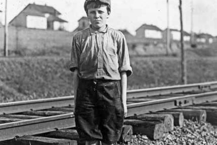 Lewis Hine photographed young children who worked in factory mills, like this child in Lindale, Georgia, a community that no longer exists.