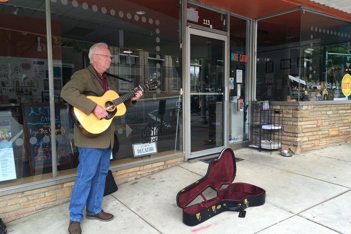 Jim Anderson plays for tips and performance practice in Decatur