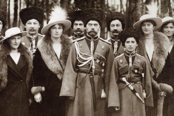 The Romanovs visiting a regiment during World War I. From left to right, Grand Duchess Anastasia, Grand Duchess Olga, Tsar Nicholas II, Tsarevich Alexei, Grand Duchess Tatiana, and Grand Duchess Maria, and Kuban Cossacks circa 1916.