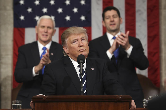 President Donald Trump addresses a joint session of Congress on Capitol Hill in Washington, Tuesday, Feb. 28, 2017, as Vice President Mike Pence and House Speaker Paul Ryan of Wis., listen.