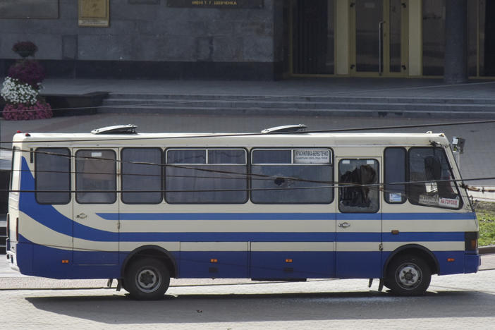 A gunman seized this bus and took 13 hostages in the city center of Lutsk, some 250 miles west of Kyiv, Ukraine, on Tuesday.