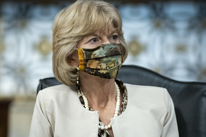Sen. Lisa Murkowski, R-Alaska, wears a face covering during a committee hearing on June 30.