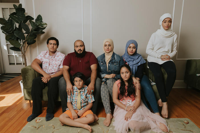 Left to Right: Naji, Ibrahim, Ahmed, Adeebah, Rahaf, Ammal and Hala Aldabaan in their Connecticut home.