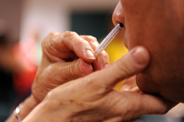 The nasal spray version of the flu vaccine contains live but weakened form of the virus. Researchers think there's a good chance this could help boost the body's immunity and improve its ability to fight off pathogens such as the coronavirus.