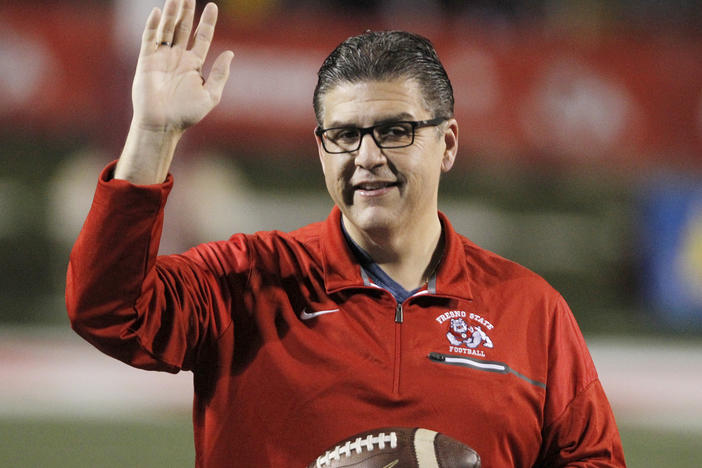 California State University, Fresno, President Joseph I. Castro waves to the crowd before an NCAA college football game against BYU in Fresno, Calif. on Nov. 4, 2017. Castro has been chosen as the chancellor of the California State University, becoming the first person of color to lead the nation's largest four-year public university system.
