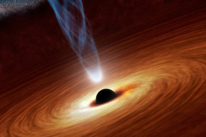 The 2020 Nobel Prize in physics was awarded to three scientists for their work on black holes. This artist's concept illustrates a supermassive black hole with millions to billions times the mass of Earth's sun.