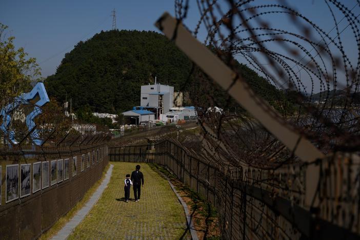 A North Korean man defected to South Korea by hopping a fence along the Demilitarized Zone separating the two countries.