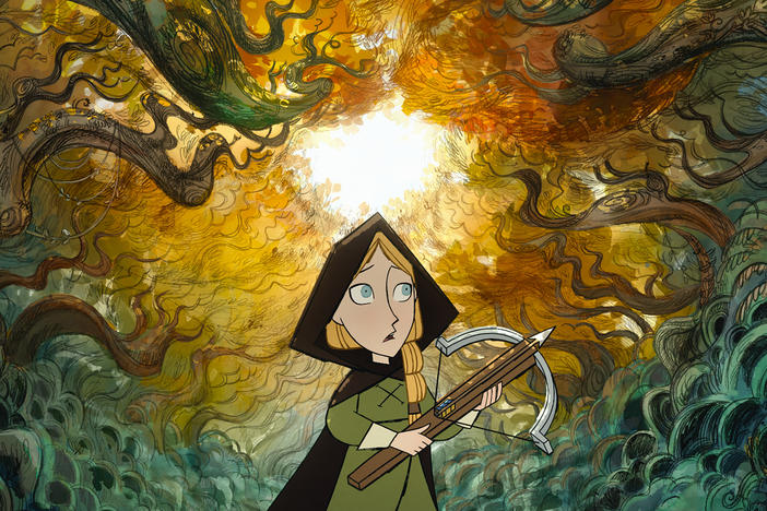 Robyn (voiced by Honor Kneafsey) heads into the woods in the animated film <em>Wolfwalkers</em>.
