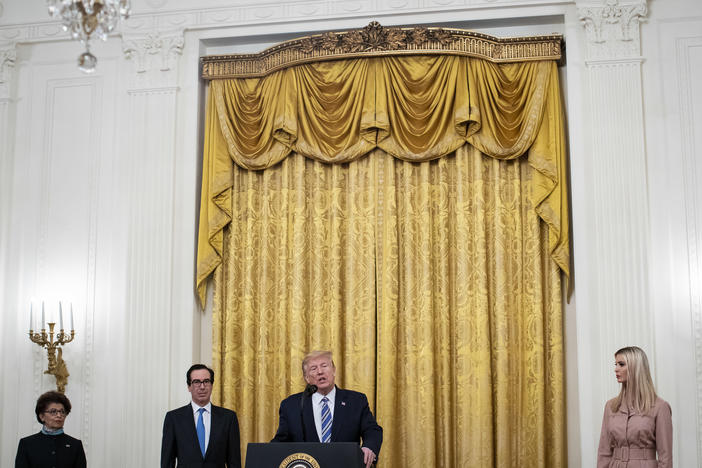 President Trump speaks in April about the Paycheck Protection Program. From left are Jovita Carranza, head of the Small Business Administration; Treasury Secretary Steven Mnuchin; and adviser Ivanka Trump.