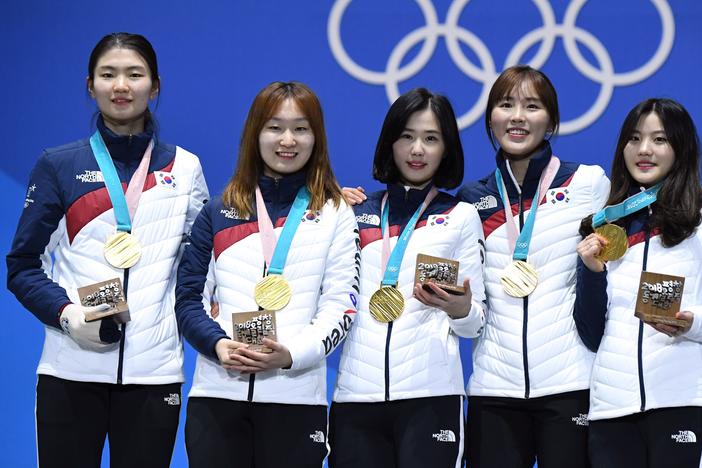 South Korean gold medalist Shim Suk-hee (far left), shown with her relay teammates during the 2018 Winter Olympics in Pyeongchang, South Korea, accused her former coach of repeated sexual assault.