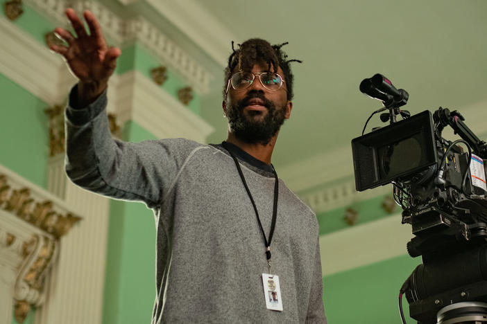 Director Shaka King on the set of<em> Judas and the Black Messiah.</em> The film<em> </em>chronicles the life of Illinois Black Panther Party leader Fred Hampton through the eyes of William O'Neal — the man who infiltrated the group on behalf of the FBI.