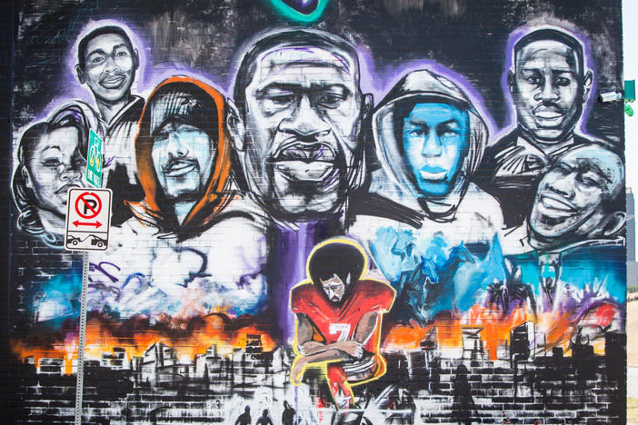 A mural honoring George Floyd and the larger Black Lives Matter movement is pictured on a wall of Native Hostel. It was created by local artist Chris Rogers.