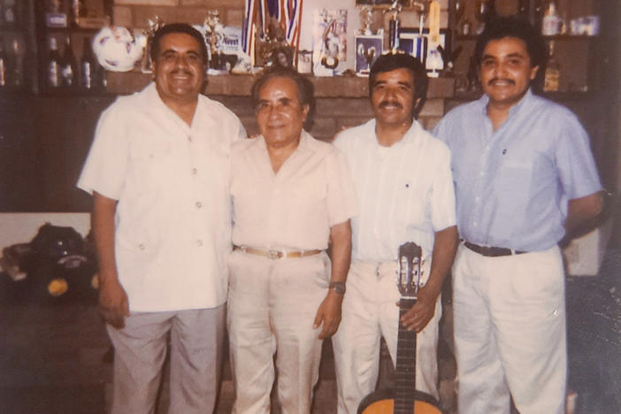 The Aldaco family of Phoenix suffered multiple losses in this year of unfathomable pain. Three brothers perished in the pandemic: Jose (left) in July, Heriberto Jr. (right) in December and Gonzalo (holding guitar) in February. They appear in this undated family photo with their father (second from left).