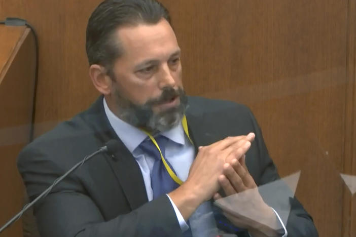 Minneapolis Police Lt. Johnny Mercil testifies Tuesday in the trial of former officer Derek Chauvin. Mercil told jurors that the technique Chauvin used to restrain George Floyd was not taught by the police.