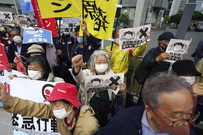 People in Tokyo protest a decision to start releasing into the ocean massive amounts of treated wastewater from the Fukushima nuclear plant. The plant was damaged in a 2011 earthquake and tsunami.