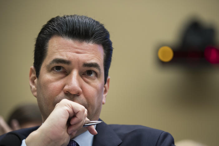 Dr. Scott Gottlieb, then commissioner of the Food and Drug Administration, testifies during a House hearing on in October 2017. In an NPR interview, Gottlieb says he doesn't expect enough demand for the COVID-19 vaccine much beyond 160 million Americans.