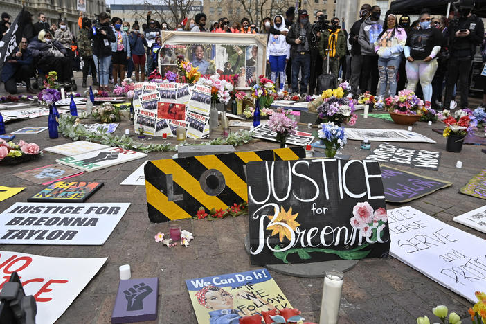 Protesters gathered at a memorial a Louisville, Ky. park on March 13, 2021, the anniversary of Breonna Taylor's killing. Jonathan Mattingly, one of the officers involved in the fatal raid, is facing widespread criticism for planning to publish a book about it.