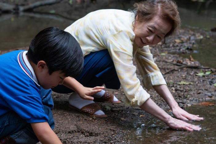 In the film <em>Minari, </em>Soonja develops a special bond with her grandson David, played by Alan Kim.