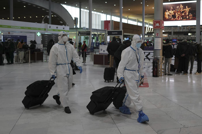 Global travel continues to be risky because of the coronavirus. Earlier this year, passengers from Taiwan wear protective gear as they arrive at France's Charles de Gaulle Airport, and just this week, the U.S. issued over 100 new travel advisories.