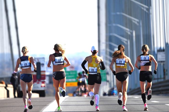 A group of runners compete in the New York City Marathon in 2019. It's one of many big city races to return this year after they were cancelled over pandemic health restrictions in 2020.