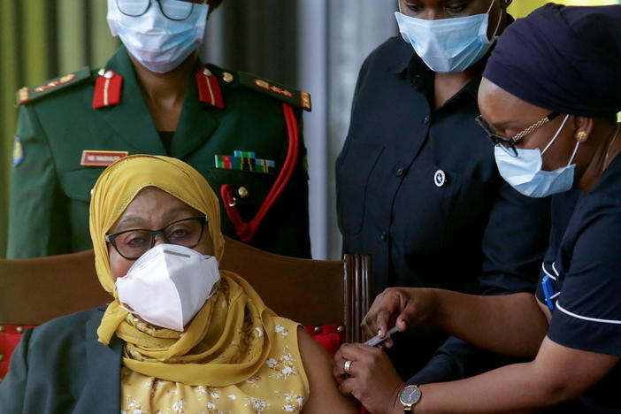 Tanzania's President Samia Suluhu Hassan receives her Johnson & Johnson vaccine against the coronavirus at the statehouse in Dar es Salaam on July 28. Her administration has reversed the government's anti-vaccination stance.
