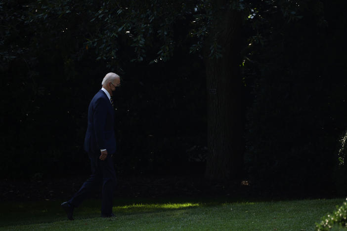 President Biden walks to the Oval Office after arriving on Marine One.