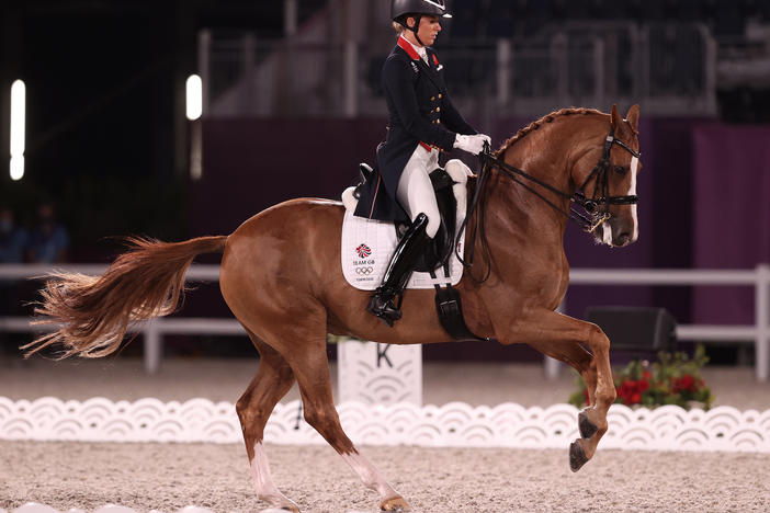 Great Britain's Charlotte Dujardin rides Gio while competing in the Dressage Individual Grand Prix Freestyle Final on July 28 at the Tokyo Olympic Games.