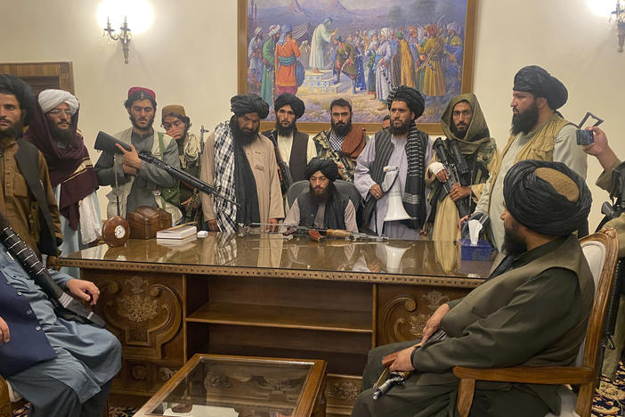 Taliban fighters take control of Afghan presidential palace in Kabul after the Afghan President Ashraf Ghani fled the country on Sunday.