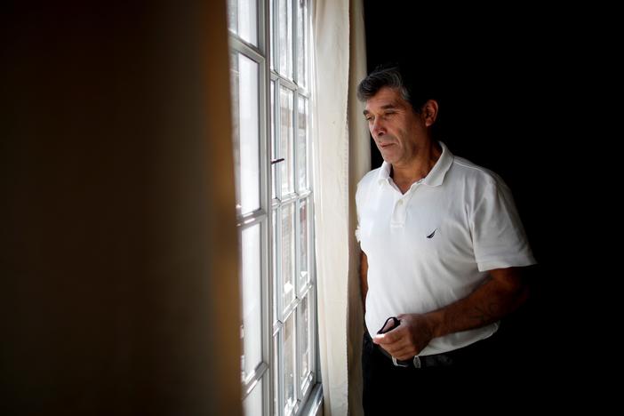 Claudio Rojas, a 55-year-old handyman who was deported from the U.S. in 2019, poses for a photo in his home in Moreno, Argentina, on May 8. His wife, two sons and two grandsons remained in Florida.
