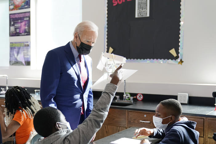 President Biden tours Brookland Middle School in Washington, D.C., on Friday. Biden has encouraged school districts to promote vaccines to protect students as they return to school amid a coronavirus resurgence.