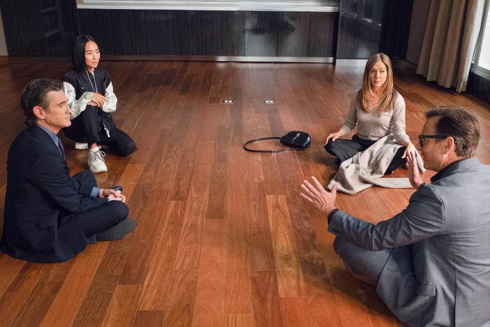 Cory (Billy Crudup), Stella (Greta Lee), Alex (Jennifer Aniston) and Doug (Will Arnett) do a little contract negotiation.