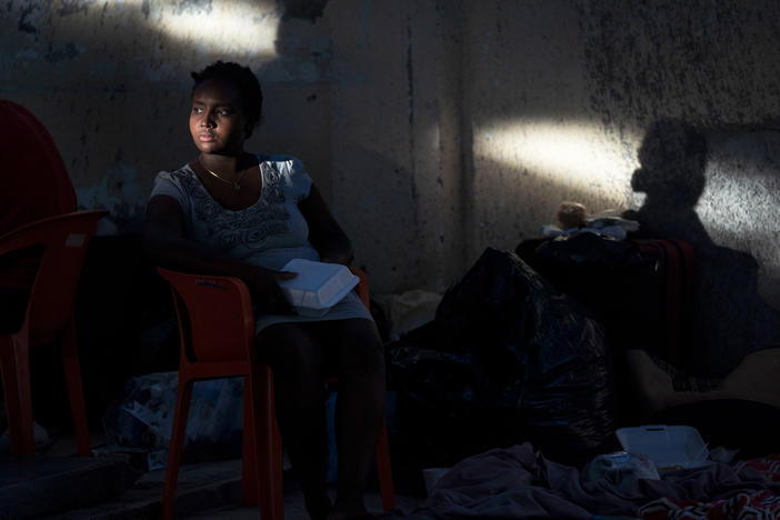 A Haitian migrant sits in a shelter in Ciudad AcuÃ±a, Mexico.