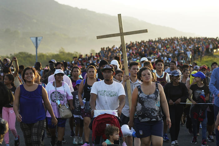 Migrants leave Huixtla, Chiapas state, Mexico, on Oct. 27 as they continue their trek north toward Mexico's northern states and the U.S. border.