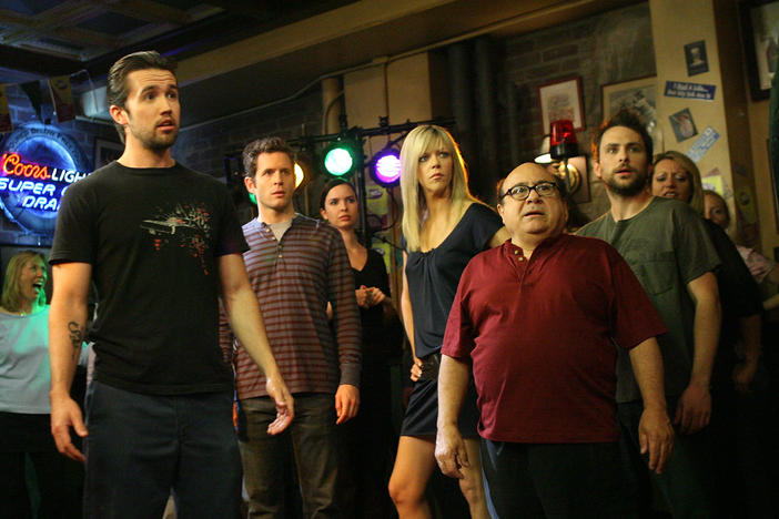Actors Rob McElhenney, Glenn Howerton, Kaitlin Olson, Danny DeVito and Charlie Day act during a dance scene on the set of "It's Always Sunny In Philadelphia" in 2007 in Los Angeles, Calif.