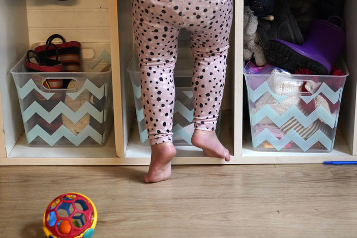 A preschooler reaches into her cubby at a preschool center in Mountlake Terrace, Wash. Journalist Claire Suddath says the U.S. child care industry is in need of an overhaul.
