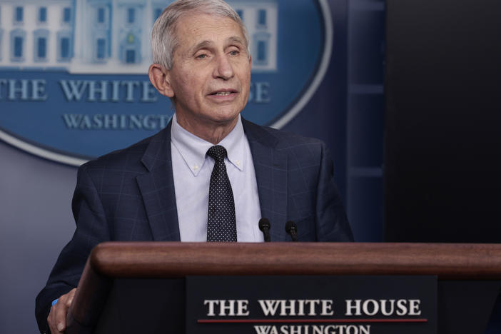 Dr. Anthony Fauci, chief medical adviser to President Biden, says easing quarantine rules for health care workers will help keep them in their essential jobs.