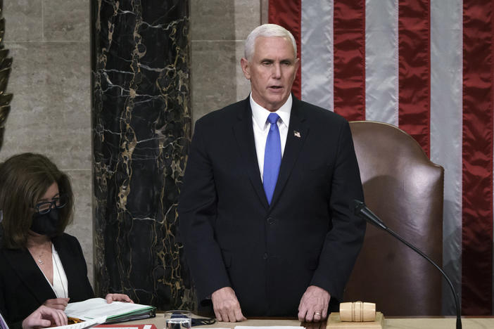 Hours after rioters stormed the Capitol on Jan. 6, 2021, Vice President Mike Pence listens after reading the final certification of the Electoral College votes cast in the 2020 presidential election.