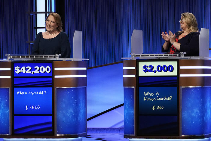 With her win Friday, Amy Schneider (left) became the first woman in <em>Jeopardy!</em> history to win more than $1 million.