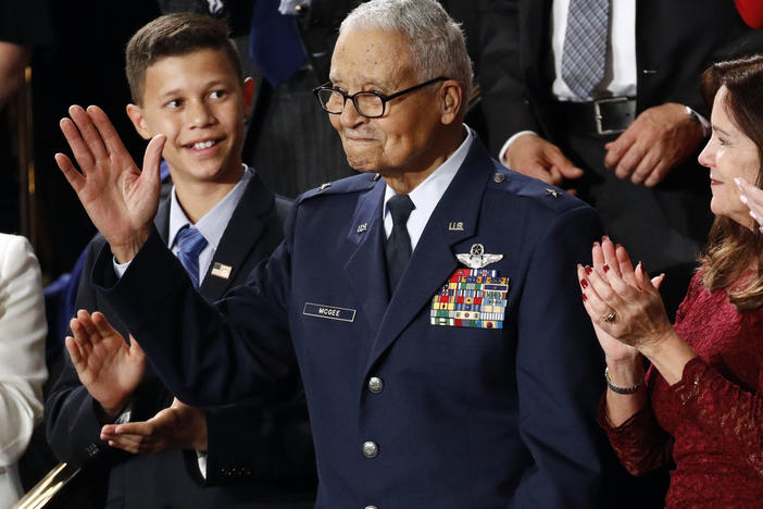 Tuskegee Airman Charles McGee and his great grandson Iain Lanphier are seen during President Donald Trump's State of the Union address on Feb. 4, 2020. McGee, one of the last surviving Tuskegee Airmen, who flew 409 fighter combat missions over three wars, died Sunday.