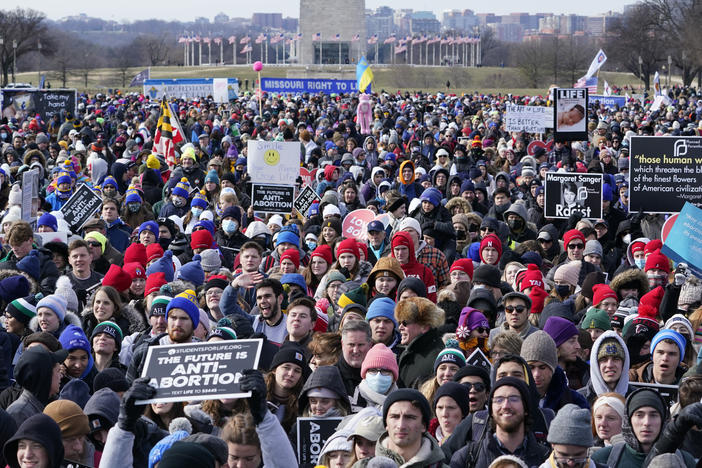 People attend the March for Life rally on the National Mall in Washington, D.C., on Friday. The march, in its 49th year, comes as a Supreme Court decision on abortion rights could unravel <em>Roe v. Wade</em>.