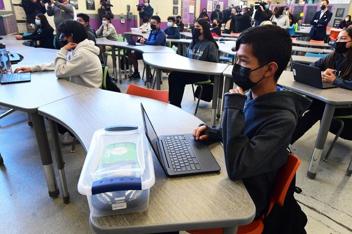 Seventh and eighth grade students attend class at Olive Vista Middle School on Jan. 11 in Sylmar, Calif. Los Angeles students will be required to wear non-cloth masks.