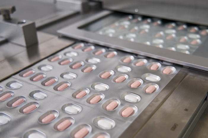Paxlovid tablets are packaged at a Pfizer factory in Italy.
