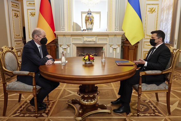 Ukrainian President Volodymyr Zelenskyy, right, speaks to German Chancellor Olaf Scholz during their meeting at The Mariinskyi Palace in Kyiv, Ukraine, on Monday. Scholz visited Ukraine as part of a flurry of Western diplomacy aimed at heading off a feared Russian invasion that some warn could be just days away.