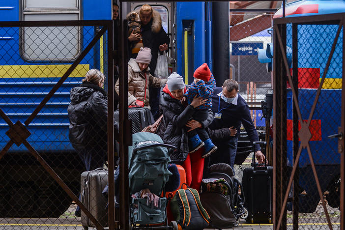 Millions have fled Ukraine, with many coming to Poland through Przemyśl's main train station.
