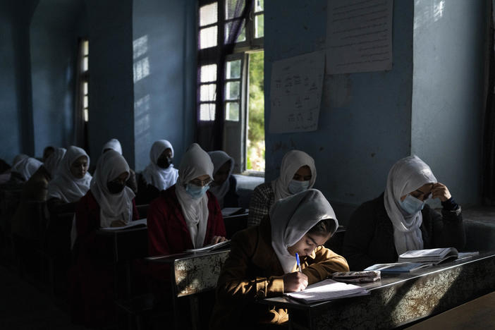 Afghan girls participate in a lesson at a high School, in Herat, on Nov. 25, 2021.