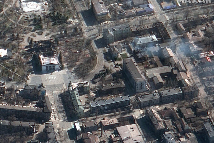 A satellite image shows the destruction wrought on the theater (center left) in Mariupol, Ukraine. The city council says around 300 people are believed to have died in the bombing.