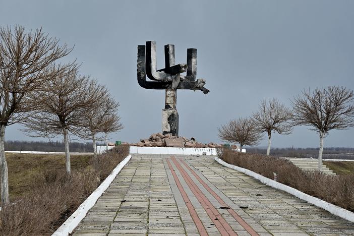 A menorah monument, located at the entrance of the Drobitsky Yar Holocaust memorial complex on the eastern outskirts of Kharkiv, is pictured on Sunday, a day after it was wrecked in a Russian shelling.