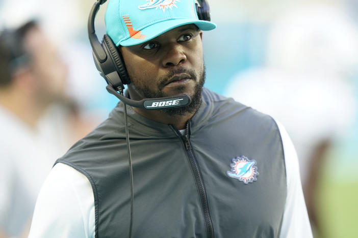 Miami Dolphins head coach Brian Flores watches a play during the first half of an NFL football game against the Carolina Panthers, Sunday, Nov. 28, 2021, in Miami Gardens, Fla.